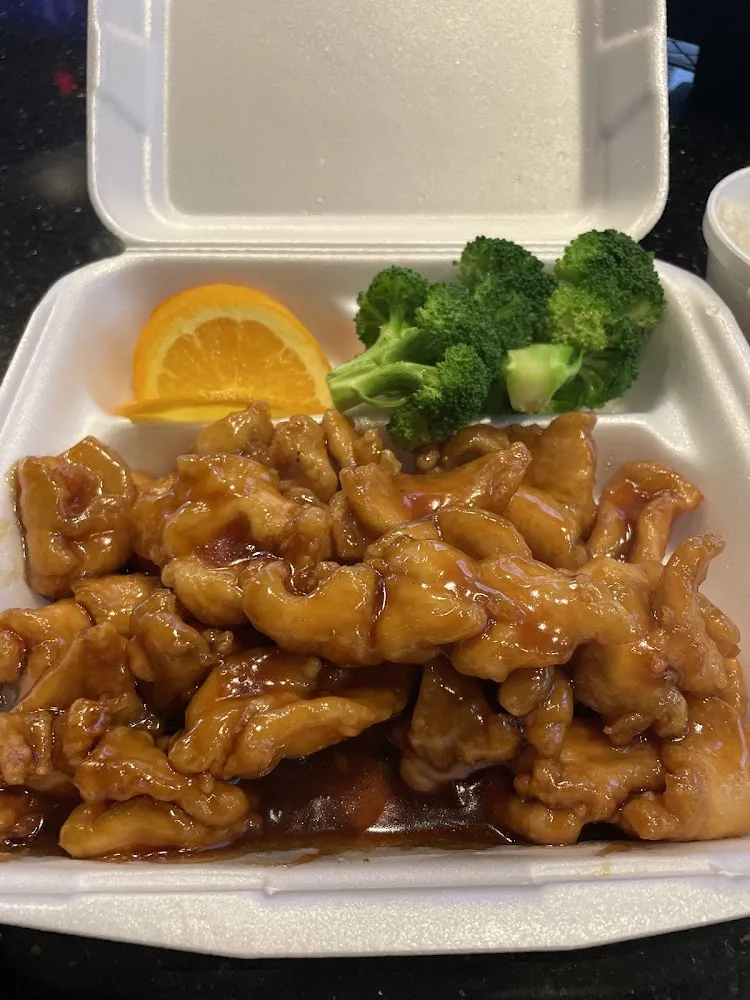 Crunchy Chicken with Mandarin Sauce Served with a Bowl of Steam Rice